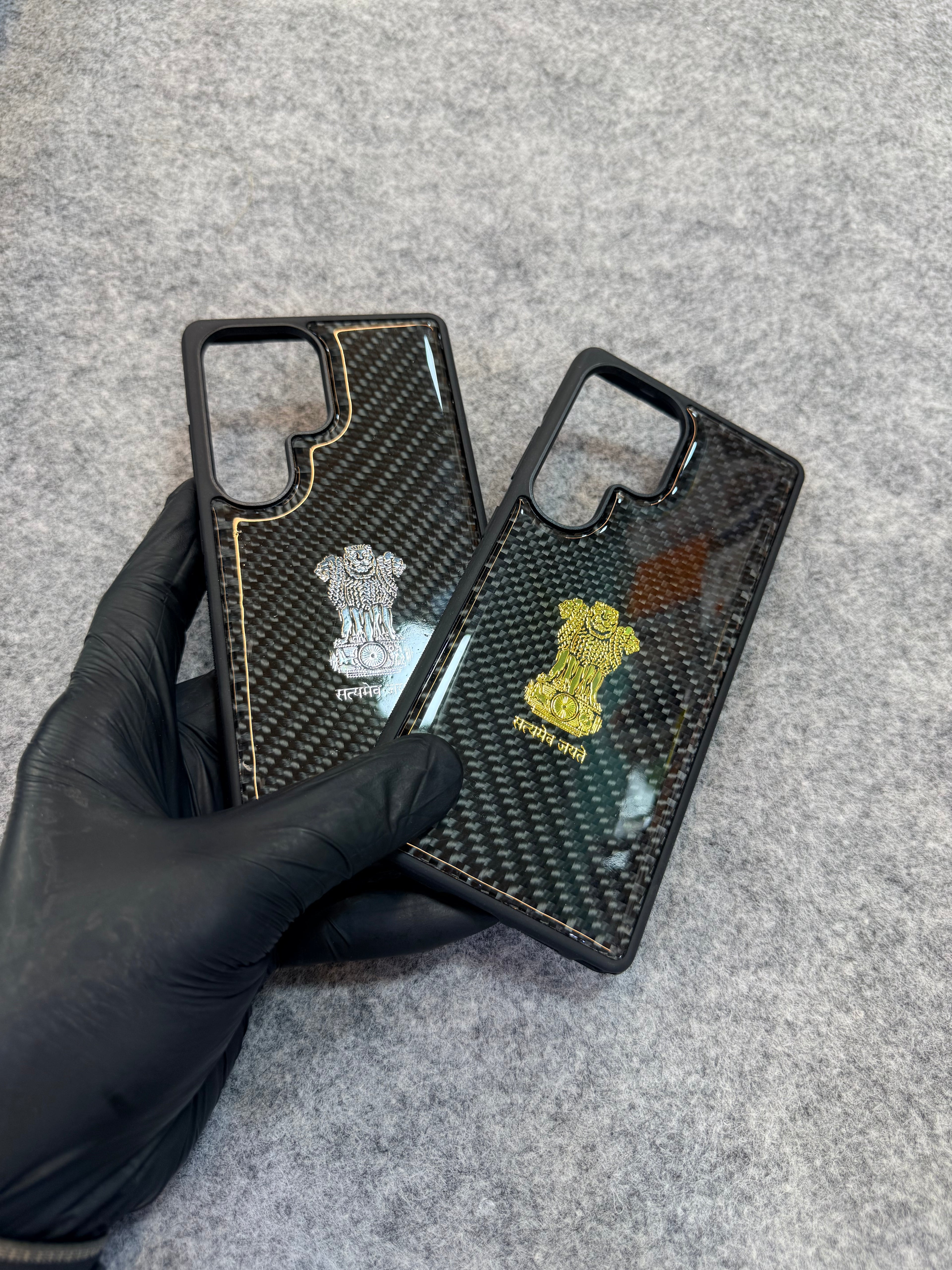Premium Carbon Fiber Phone Case with Golden Ashok Stambh Emblem
