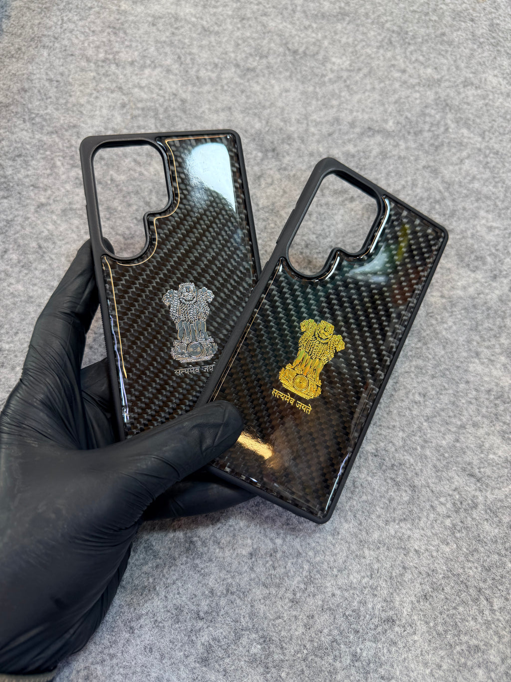 Premium Carbon Fiber Phone Case with Golden Ashok Stambh Emblem