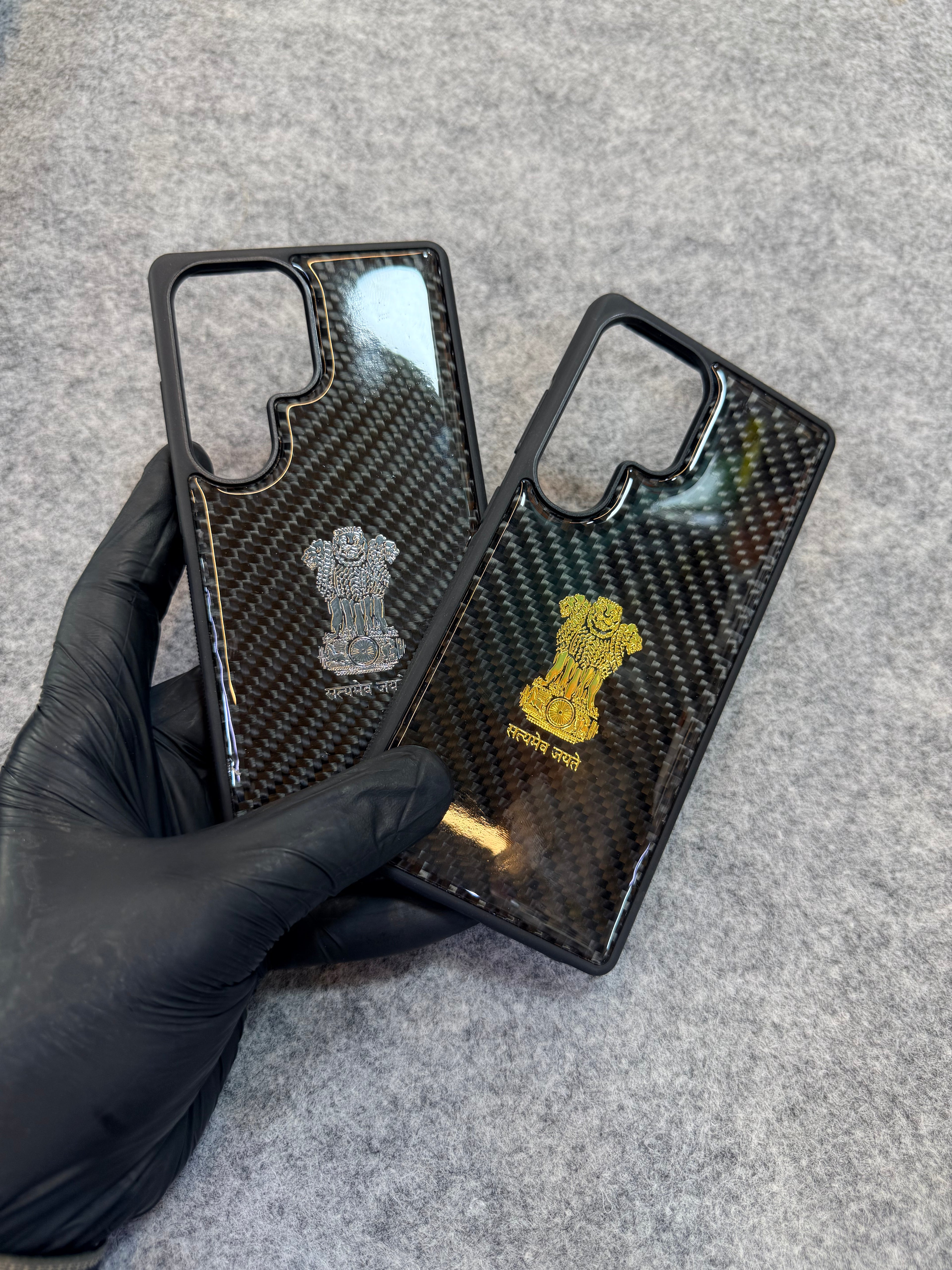 Premium Carbon Fiber Phone Case with Golden Ashok Stambh Emblem