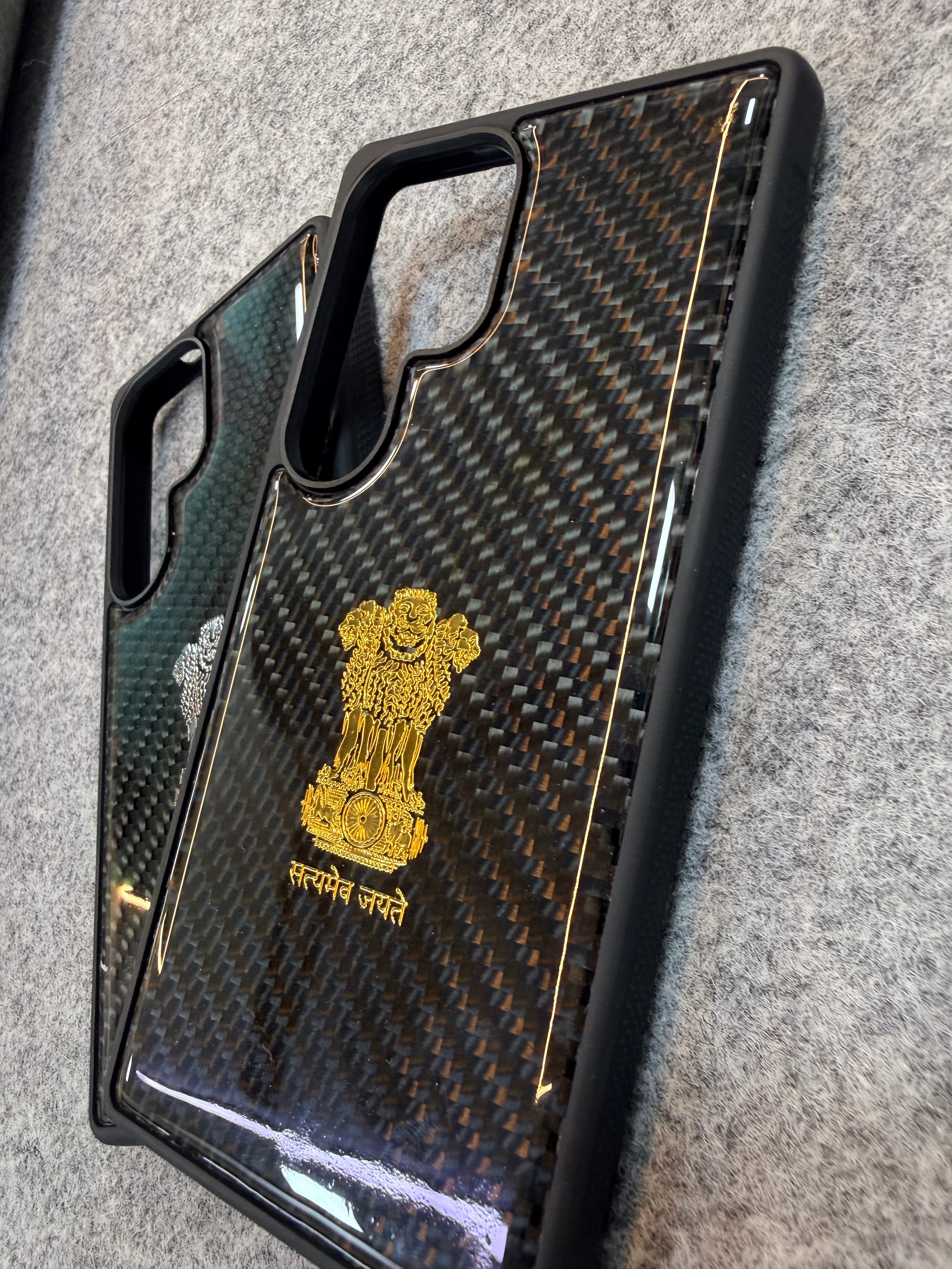 Premium Carbon Fiber Phone Case with Golden Ashok Stambh Emblem